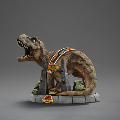 Jurassic Park "T-Rex Park Gate" Mini Co. PVC Figur T-Rex Illusion Deluxe 15 cm (2024)